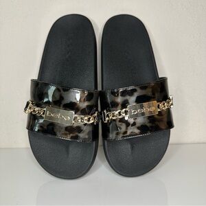 Bebe Black Leopard Slides with Gold Accent